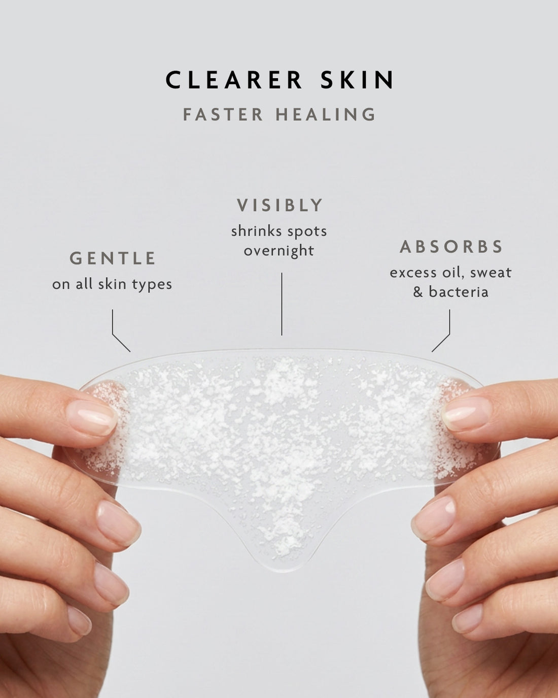 Wide hydrocolloid forehead patch that absorbs oil and shine, held in two hands
