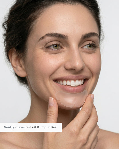 Placing a hydrocolloid patch on a breakout along the chin