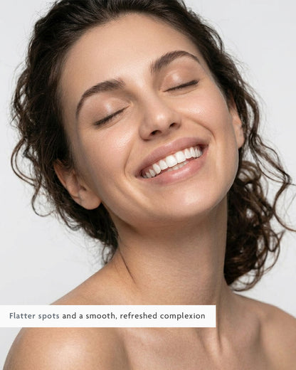 Smiling woman with a clear, calm chin and jawline