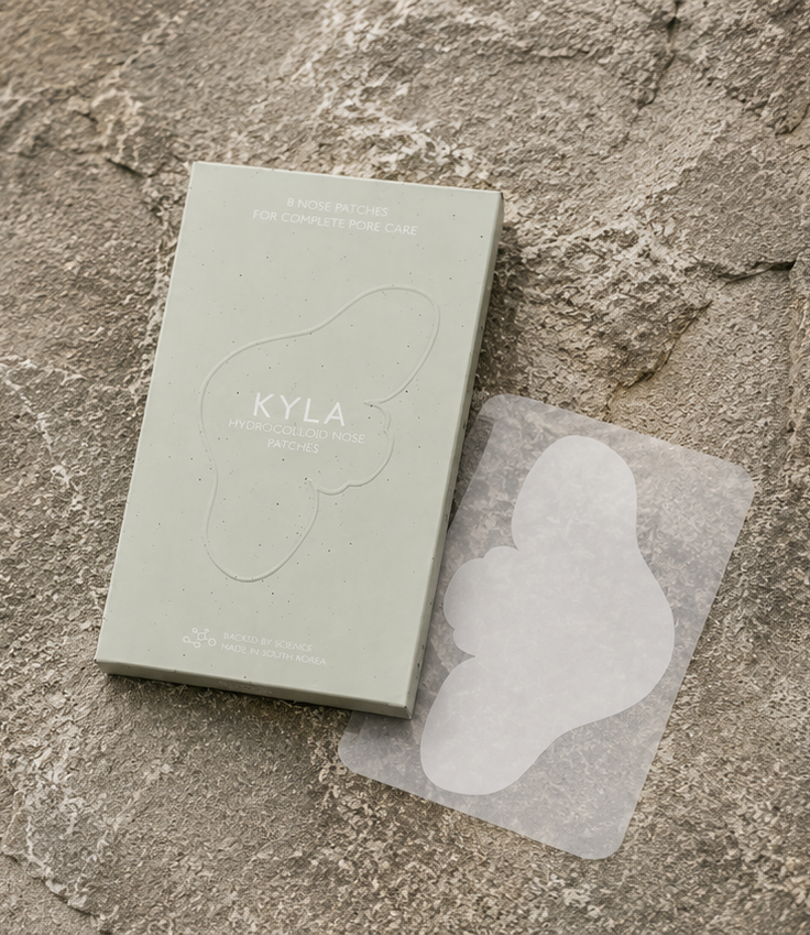 KYLA patch box and a clear hydrocolloid patch on a stone background